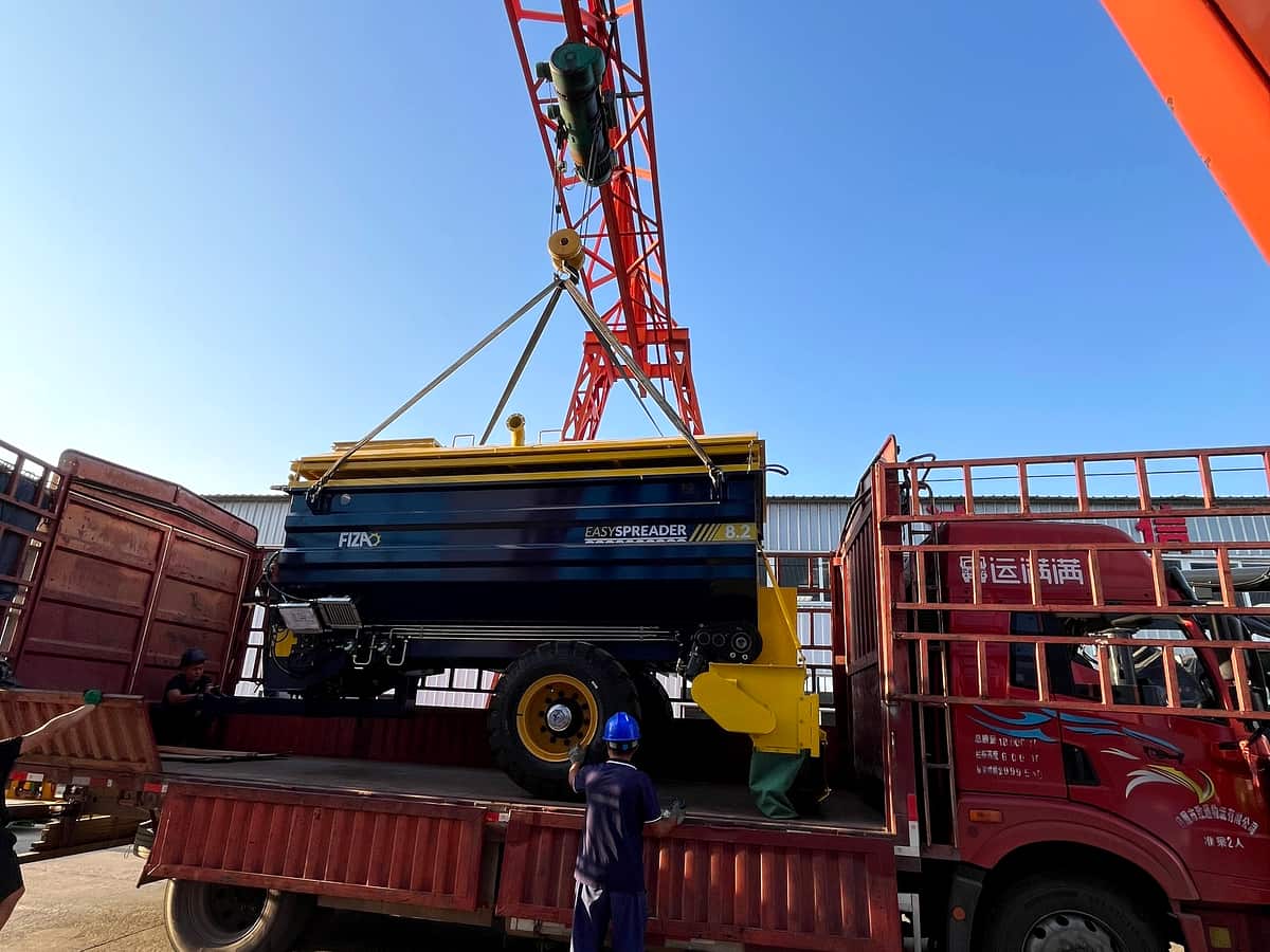 HUIFU machinery being loaded for delivery